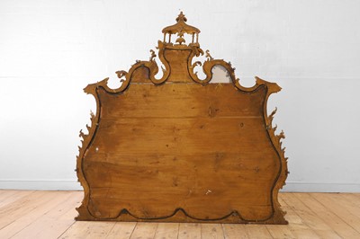 Lot 262 - A George III-style carved giltwood overmantel mirror