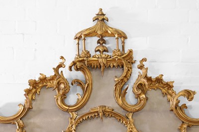 Lot 262 - A George III-style carved giltwood overmantel mirror