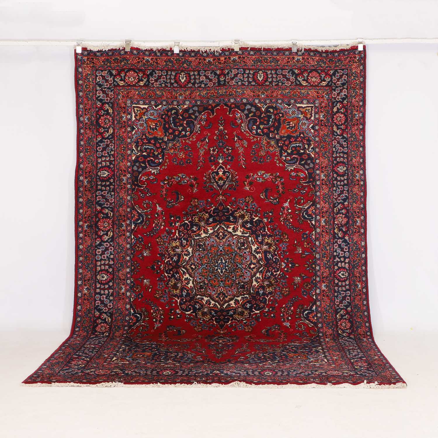 Lot 156 - A wool carpet