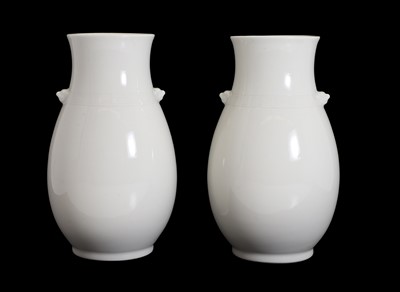 Lot 138 - A pair of Japanese white-glazed vases