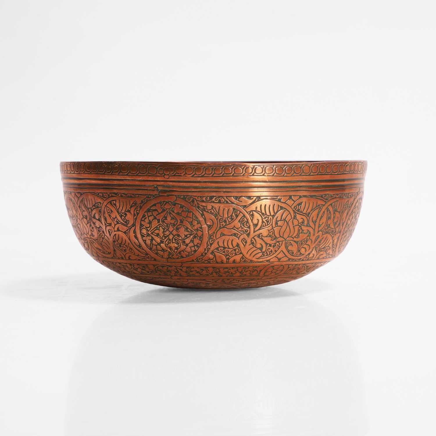 Lot 179 - An engraved Veneto-Saracenic copper bowl