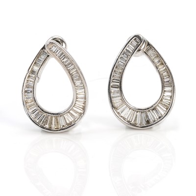 Lot 265 - A pair of baguette cut diamond earrings