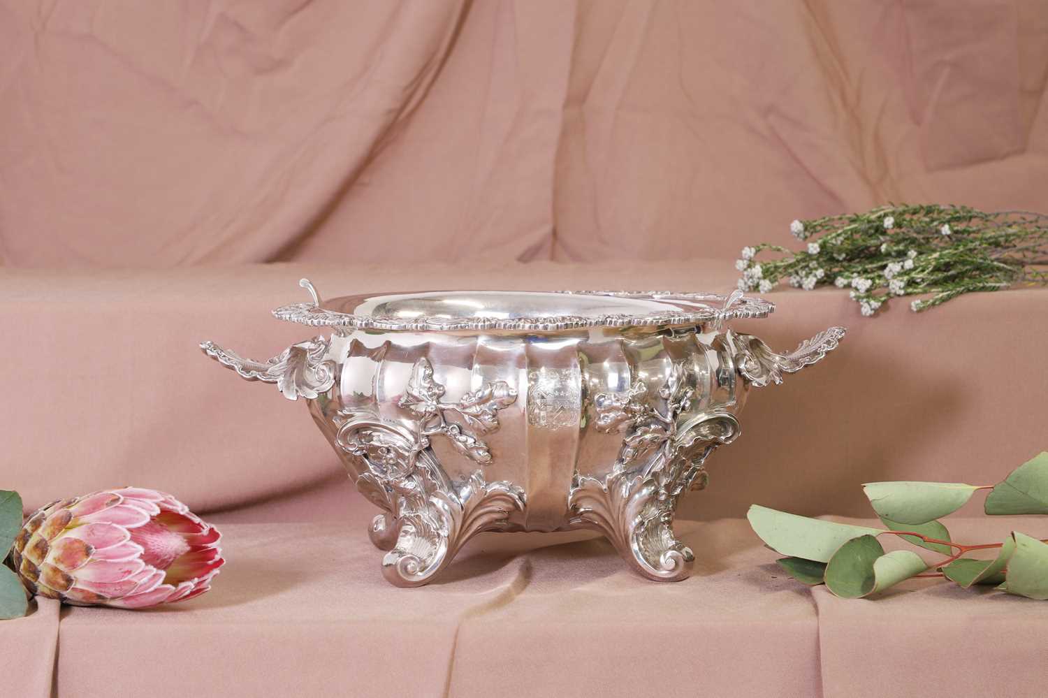 Lot 324 - A Victorian silver soufflé dish and liner
