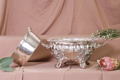 Lot 324 - A Victorian silver soufflé dish and liner