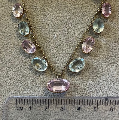 Lot 58 - A pink topaz and aquamarine fringe necklace, c.1900