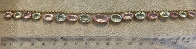 Lot 58 - A pink topaz and aquamarine fringe necklace, c.1900