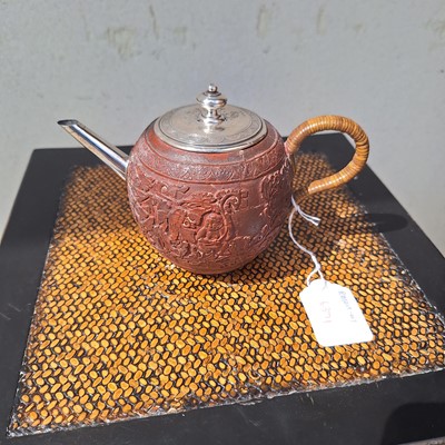 Lot 163 - A Chinese Yixing pottery teapot