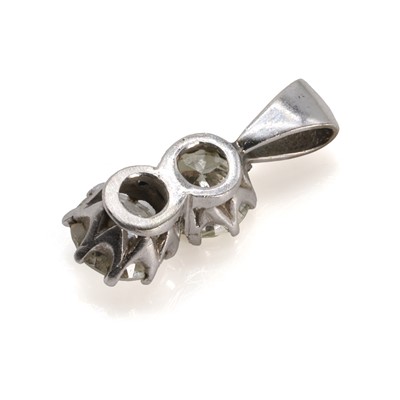 Lot 71 - A diamond two stone pendant