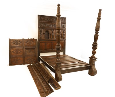 Lot 423 - An oak tester bed