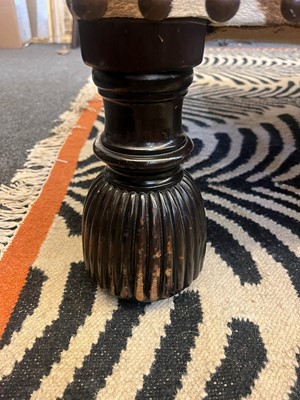 Lot 247 - A stained wood and zebra-skin stool