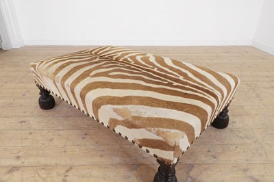 Lot 247 - A stained wood and zebra-skin stool
