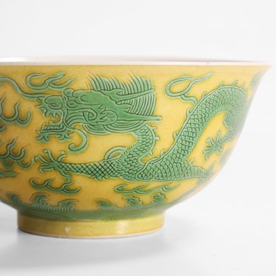 Lot 311 - A Chinese yellow ground and green-enamelled bowl