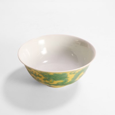 Lot 311 - A Chinese yellow ground and green-enamelled bowl