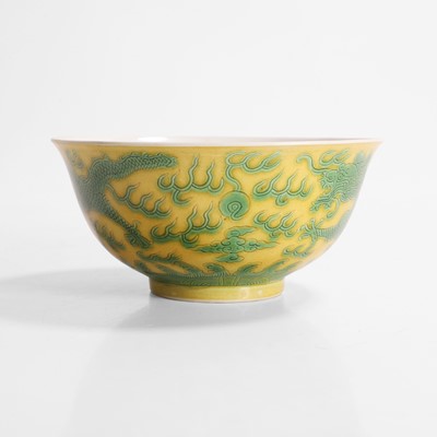 Lot 311 - A Chinese yellow ground and green-enamelled bowl