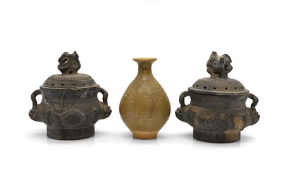 Lot 105 - A pair of Chinese black pottery incense burners