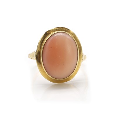 Lot 172 - An Italian gold pink coral ring
