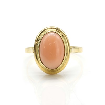 Lot 170 - An Italian gold pink coral ring