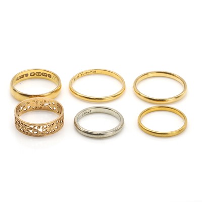 Lot 411 - A group of six gold band rings