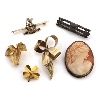Lot 412 - A group of gold and silver brooches