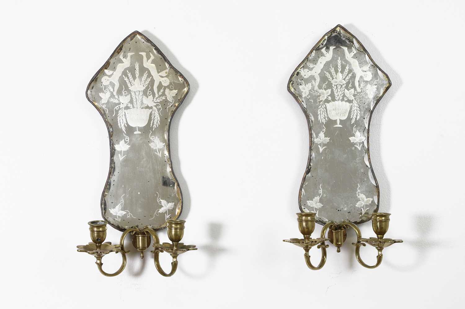 Lot 567 - A pair of etched glass wall sconces