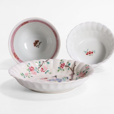 Lot 516 - A Chinese famille rose cup and saucer