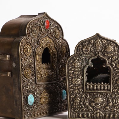 Lot 171 - Two Tibetan copper and white-metal travel shrines