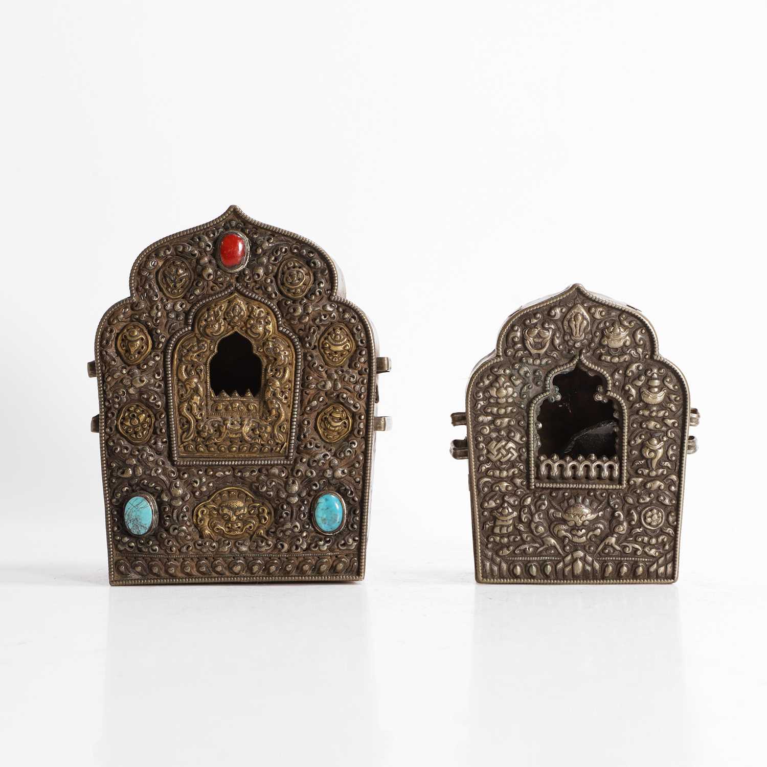 Lot 171 - Two Tibetan copper and white-metal travel shrines