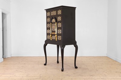 Lot 58 - A baroque ebonised fruitwood, pietra paesina, pietra dura and gilt-bronze-mounted cabinet on stand