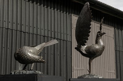 Lot Two bronze peacocks