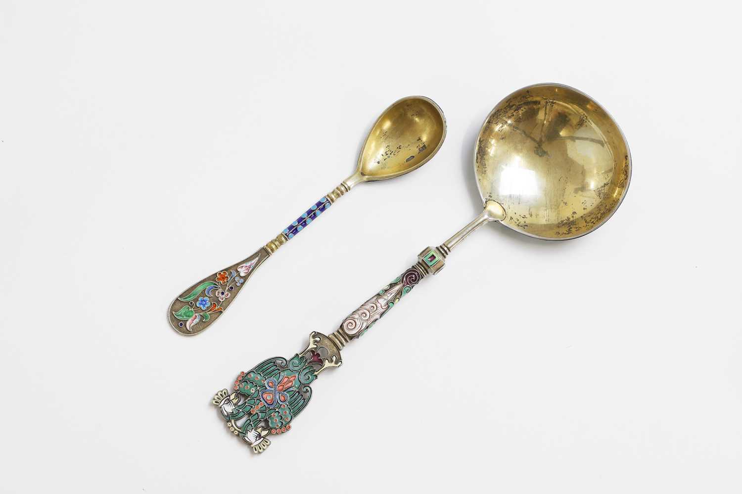 Lot 293 - Two silver-gilt and cloisonné spoons