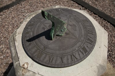 Lot 446 - A carved stone sundial
