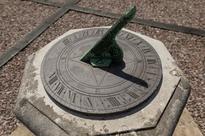 Lot 446 - A carved stone sundial