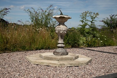 Lot 446 - A carved stone sundial