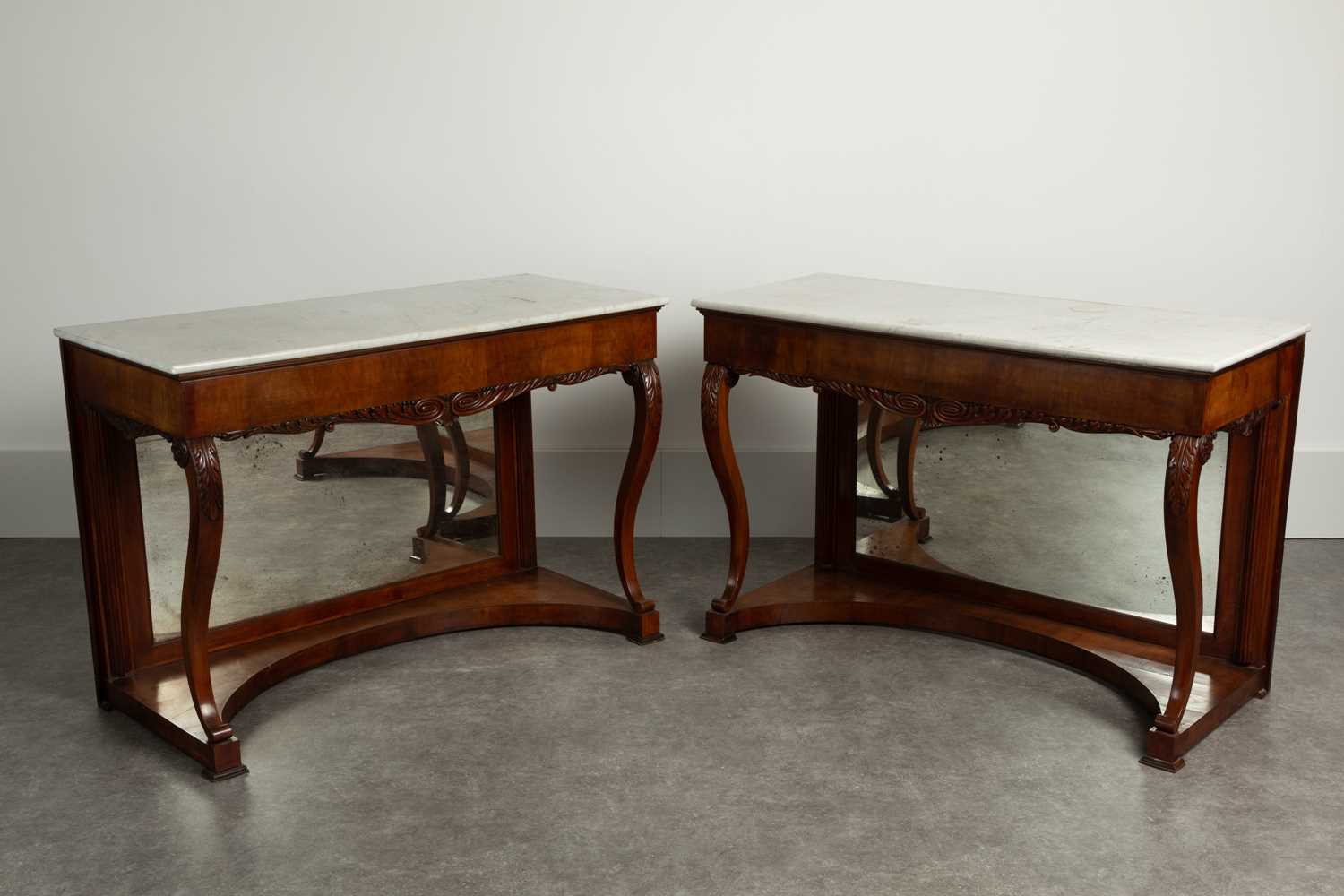 Lot 84 - A pair of walnut console tables