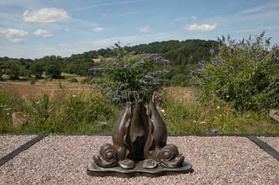 Lot 461 - A cast iron dolphin fountain