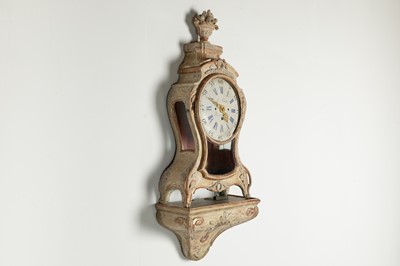 Lot 211 - A rococo cartel clock with bracket