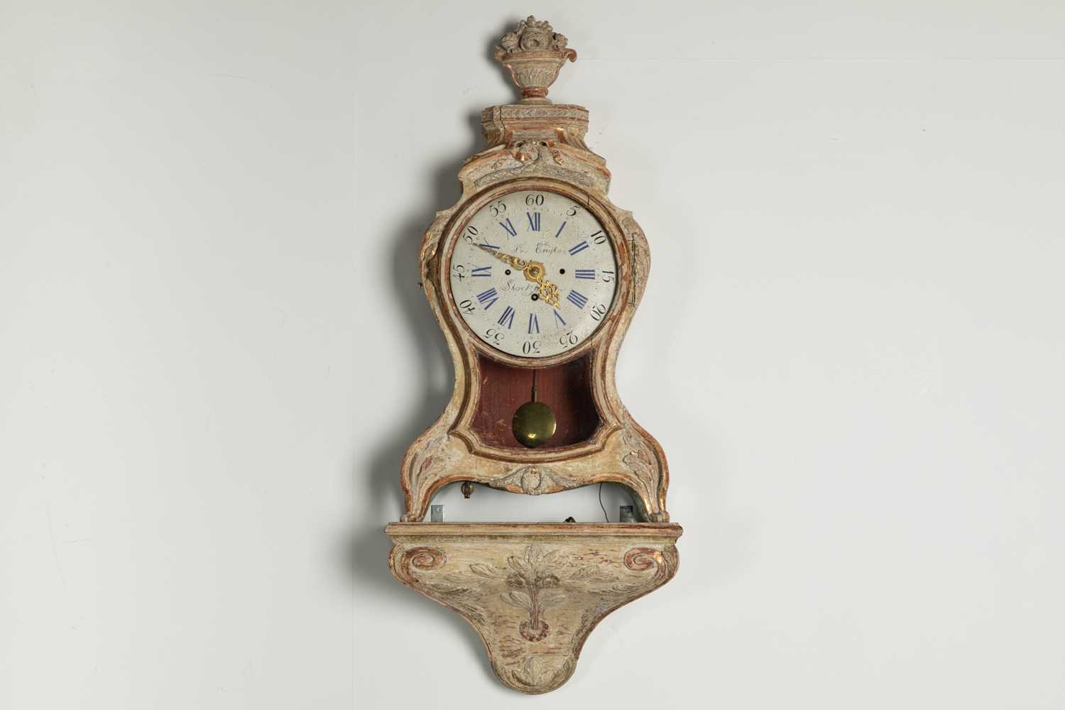 Lot 211 - A rococo cartel clock with bracket