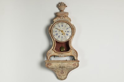 Lot 211 - A rococo cartel clock with bracket