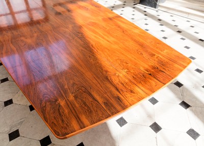 Lot 381 - A rosewood table and sixteen matching chairs