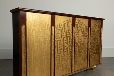 Lot 140 - A palm-veneered, redwood and ebonised cabinet