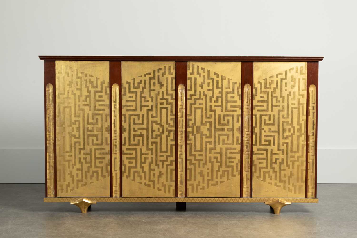 Lot 140 - A palm-veneered, redwood and ebonised cabinet