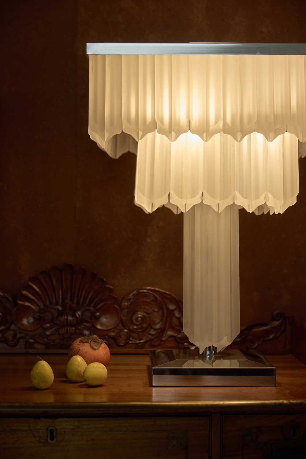 Lot 303 - A pair of Lucite and chrome table lamps