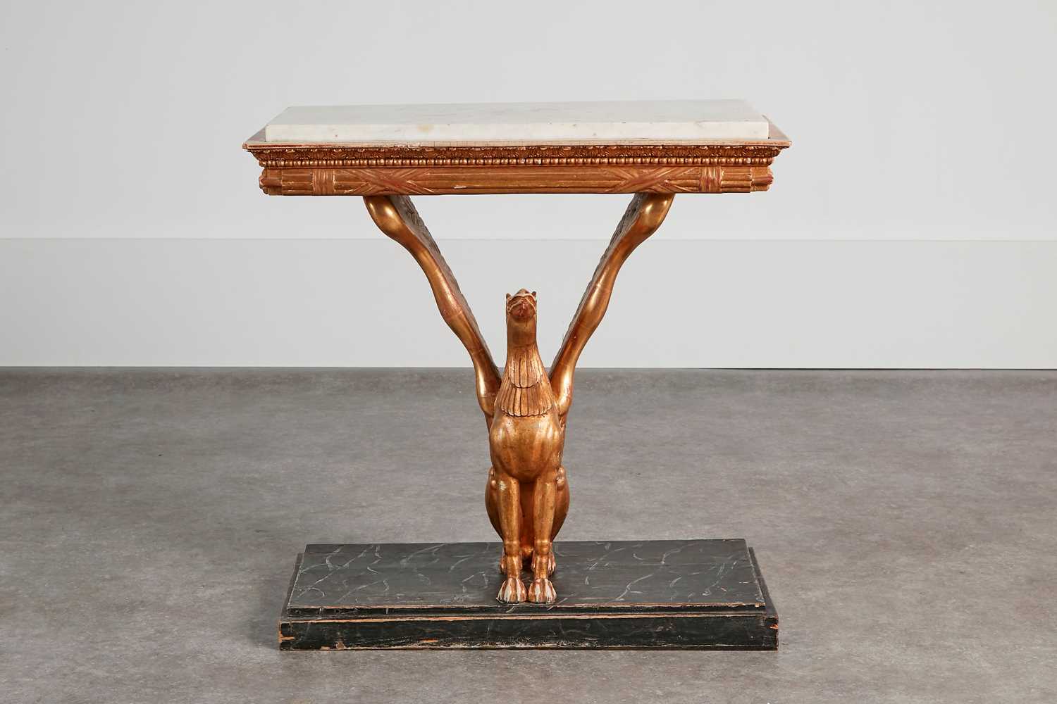Lot 206 - An Empire carved giltwood and composition console table