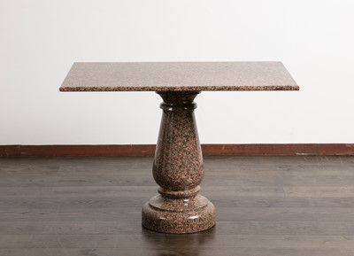 Lot 102 - A polished granite centre table