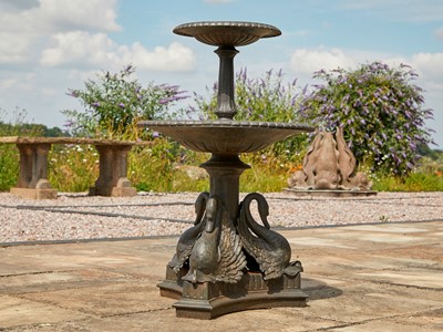 Lot 454 - A cast iron two-tiered fountain