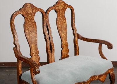Lot 38 - A pair of walnut marquetry double chair-back settees