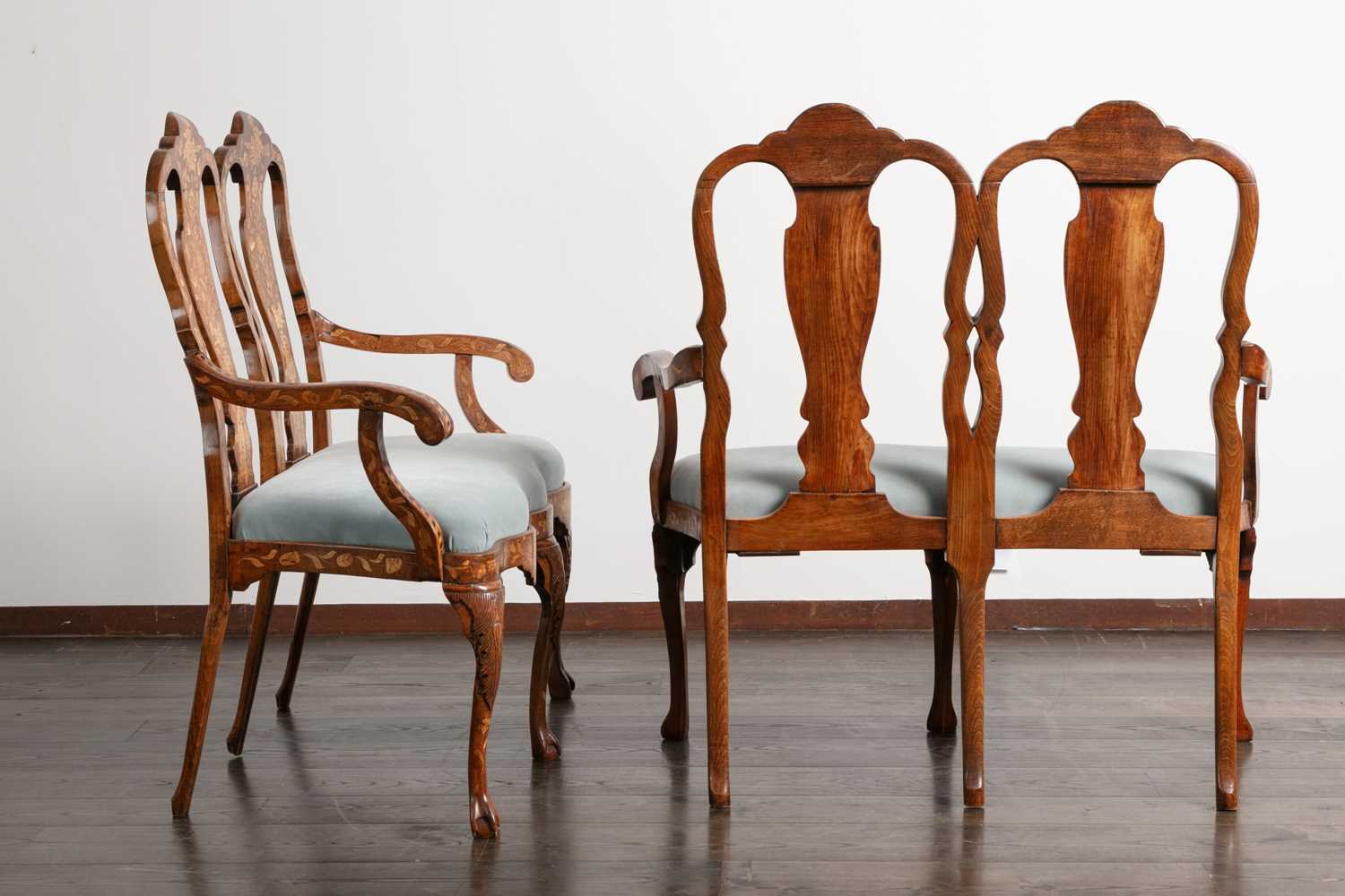 Lot 38 - A pair of walnut marquetry double chair-back settees