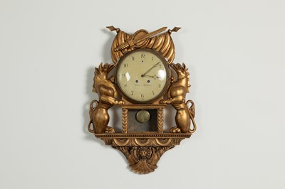Lot A carved and gilt wall clock by Wester, Stockholm
