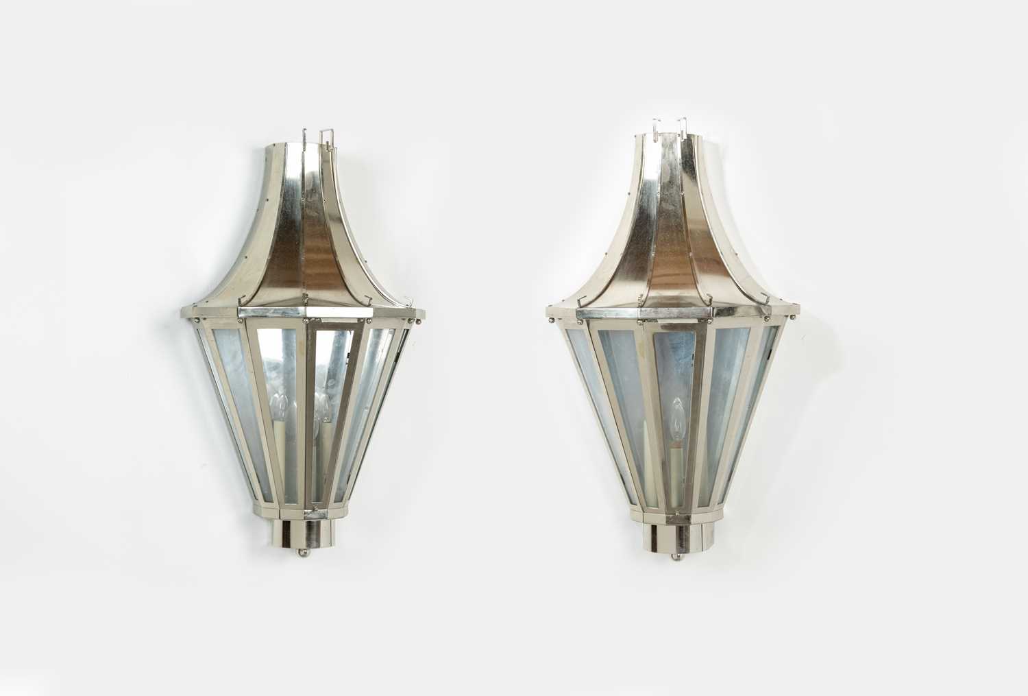 Lot 138 - A pair of nickel-plated wall lanterns