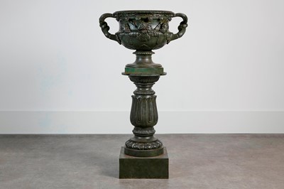 Lot 145 - A patinated cast iron model of the Warwick Vase